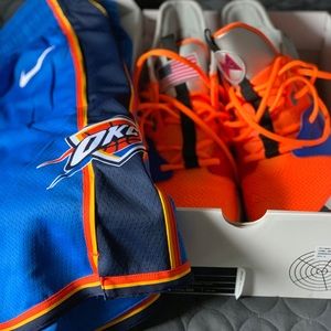 PG... Nike NASA kicks and OKC basketball shorts